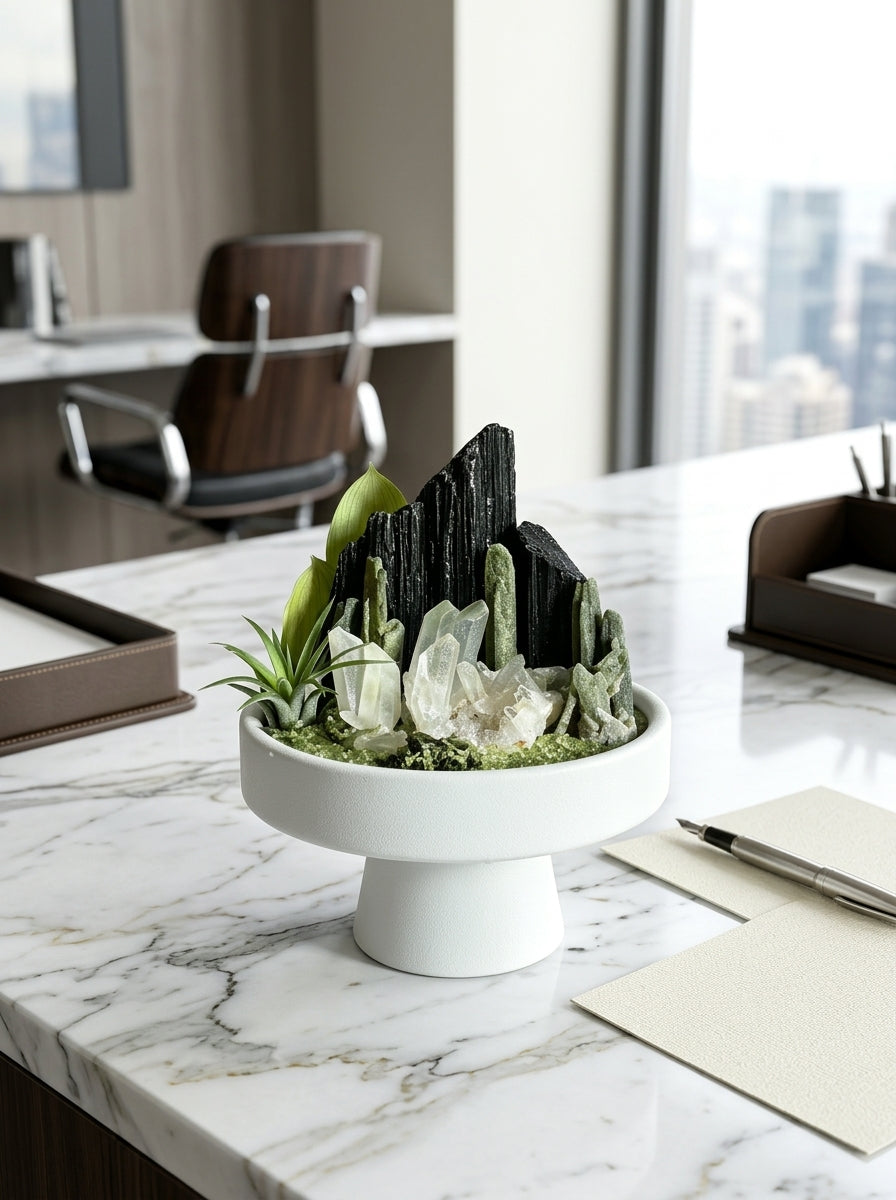 Caelum Oro: Handcrafted raw black tourmaline and clear quartz mineral oasis on a luxury marble desk for stress relief and home energy