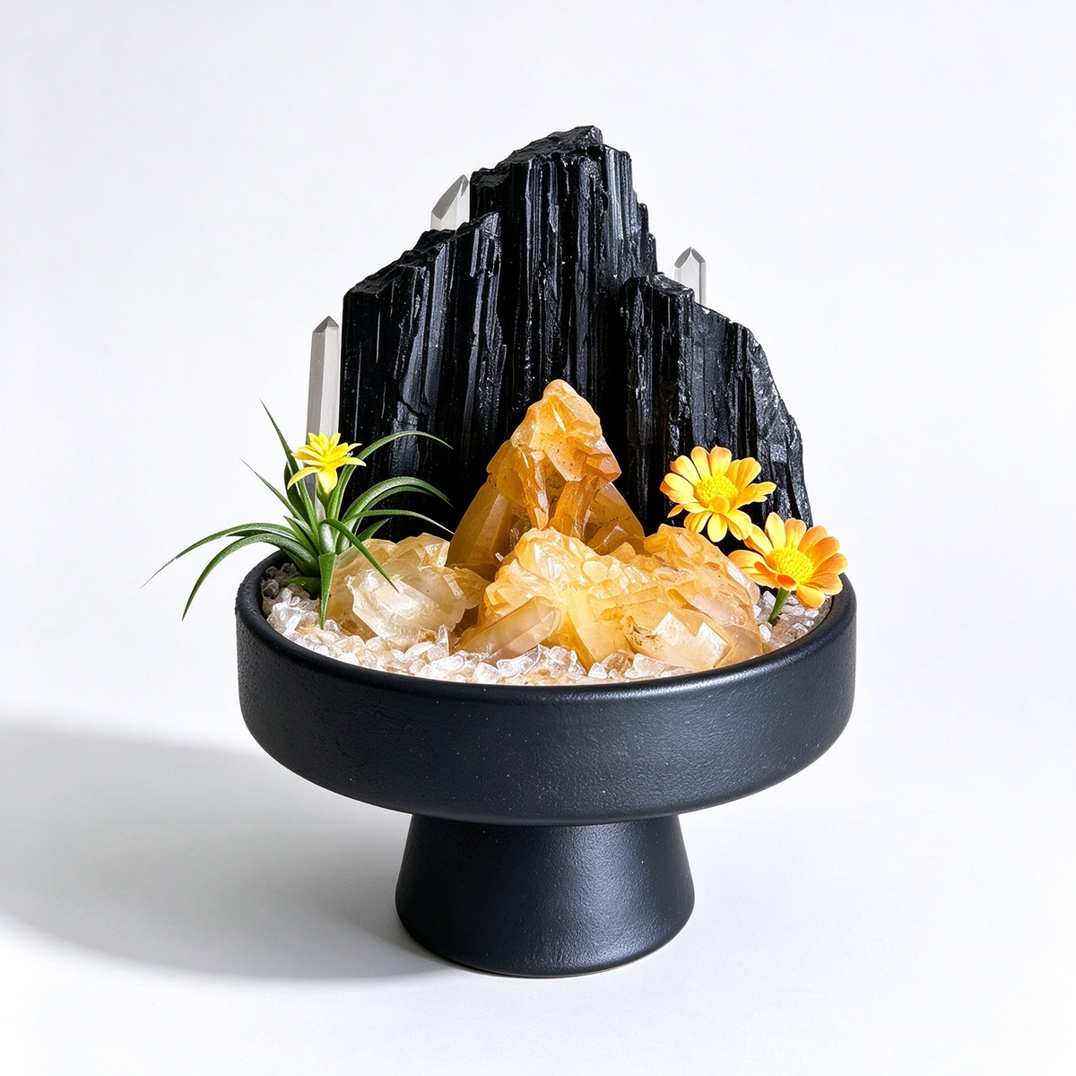 one-of-one crystal garden with black tourmaline, golden healer, clear quartz, air plant; front view on pure white background.
