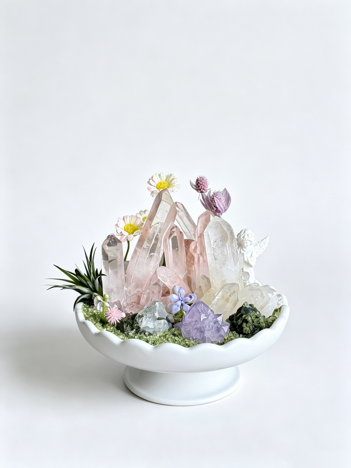 one-of-one crystal garden with porcelain angel, pink-white quartz pillars, amethyst, green fluorite, air plant; front view on pure white background.
