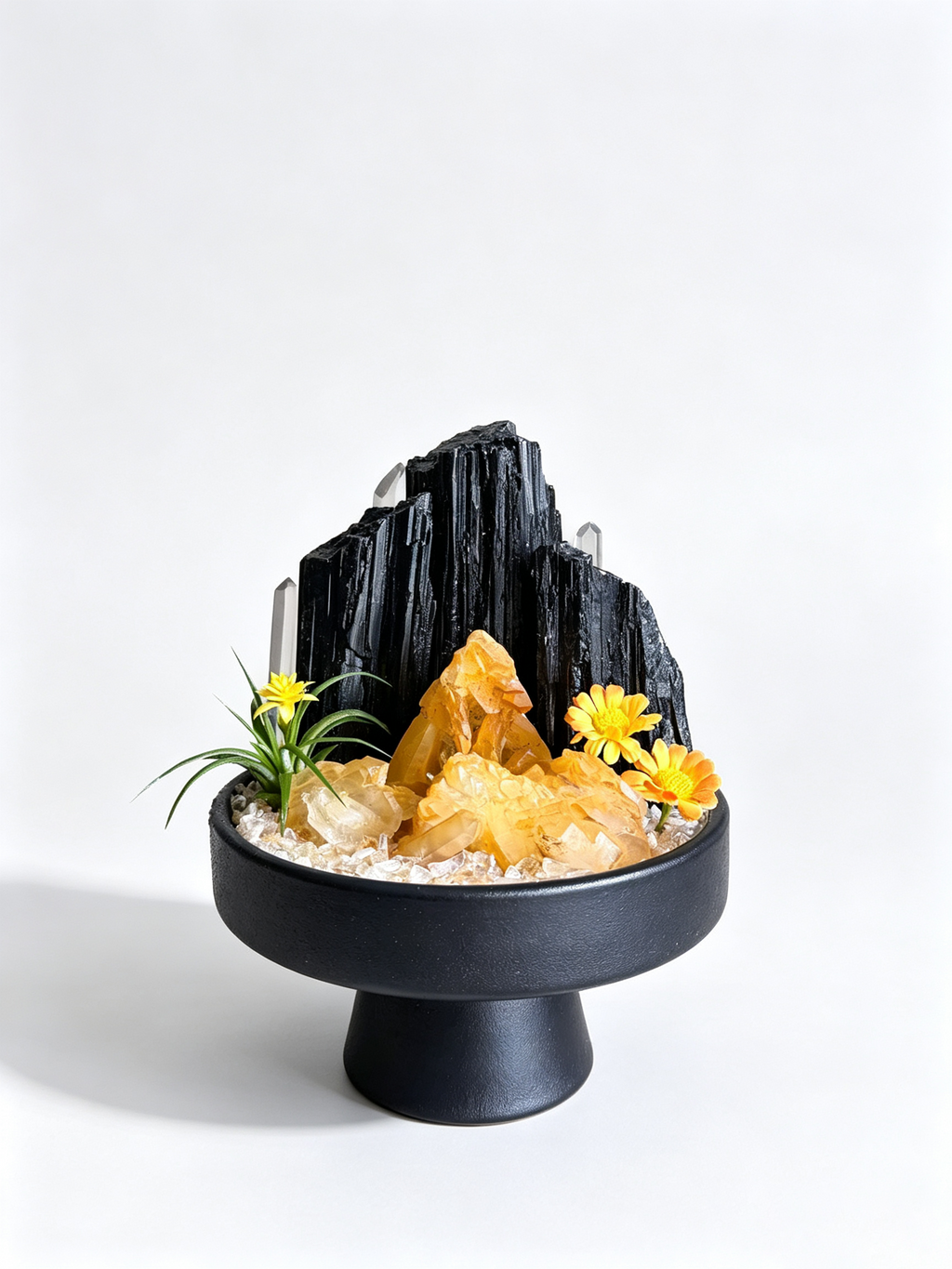 one-of-one crystal garden with black tourmaline, golden healer, clear quartz, air plant; front view on pure white background.
