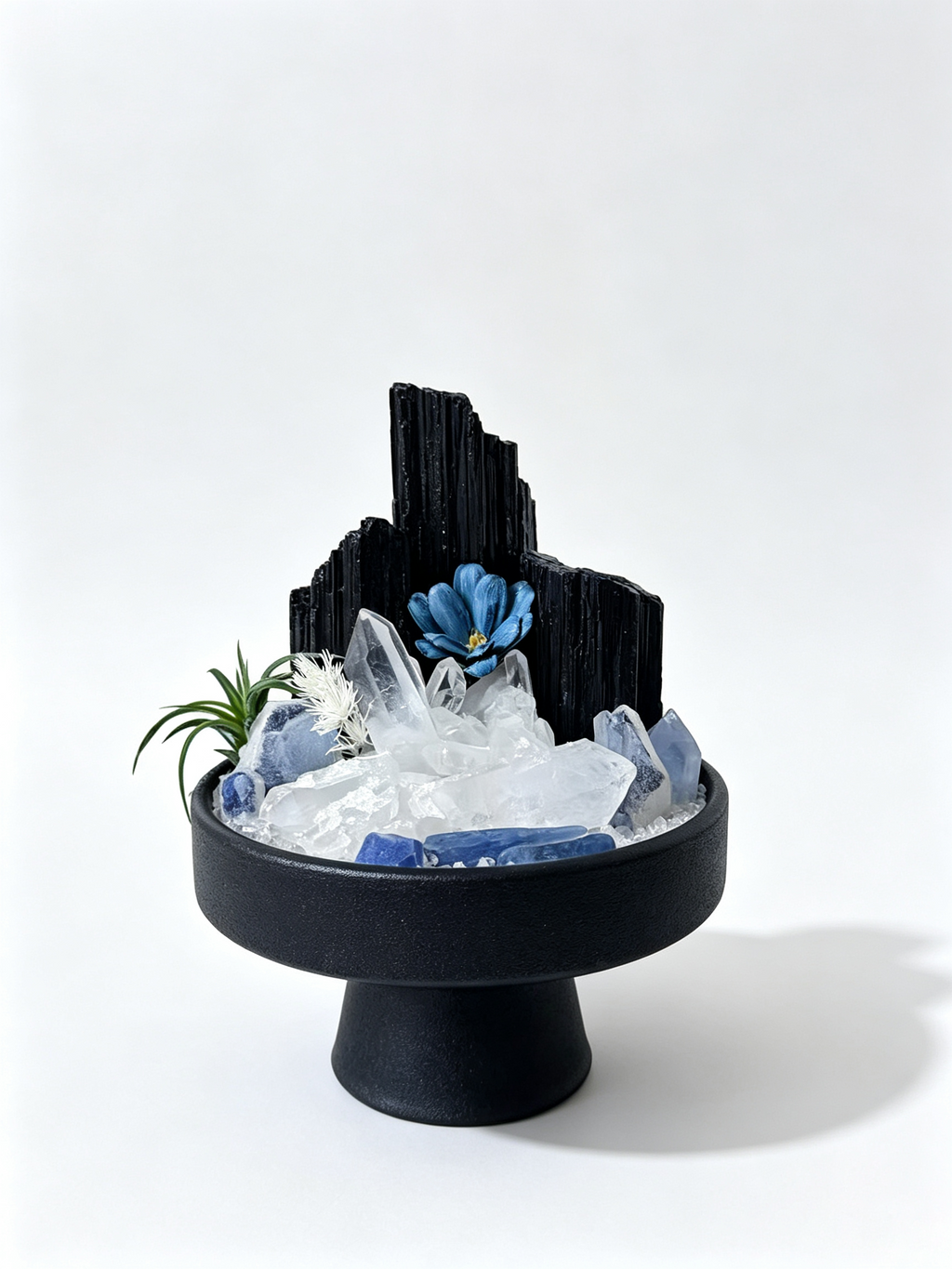 one-of-one crystal garden with blue celestite, golden citrine points, air plant; front view on pure white background.