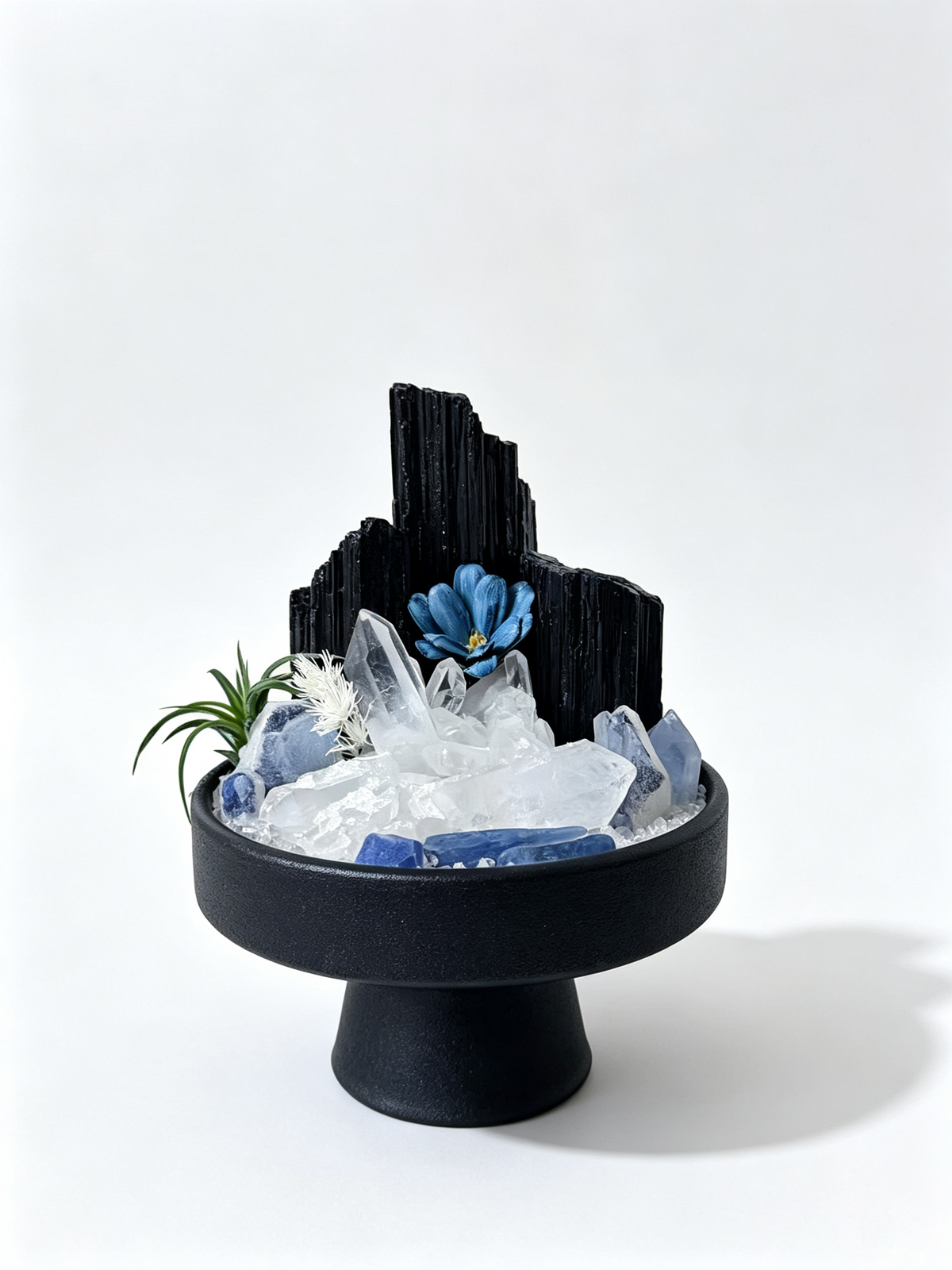 one-of-one crystal garden with blue celestite, golden citrine points, air plant; front view on pure white background.