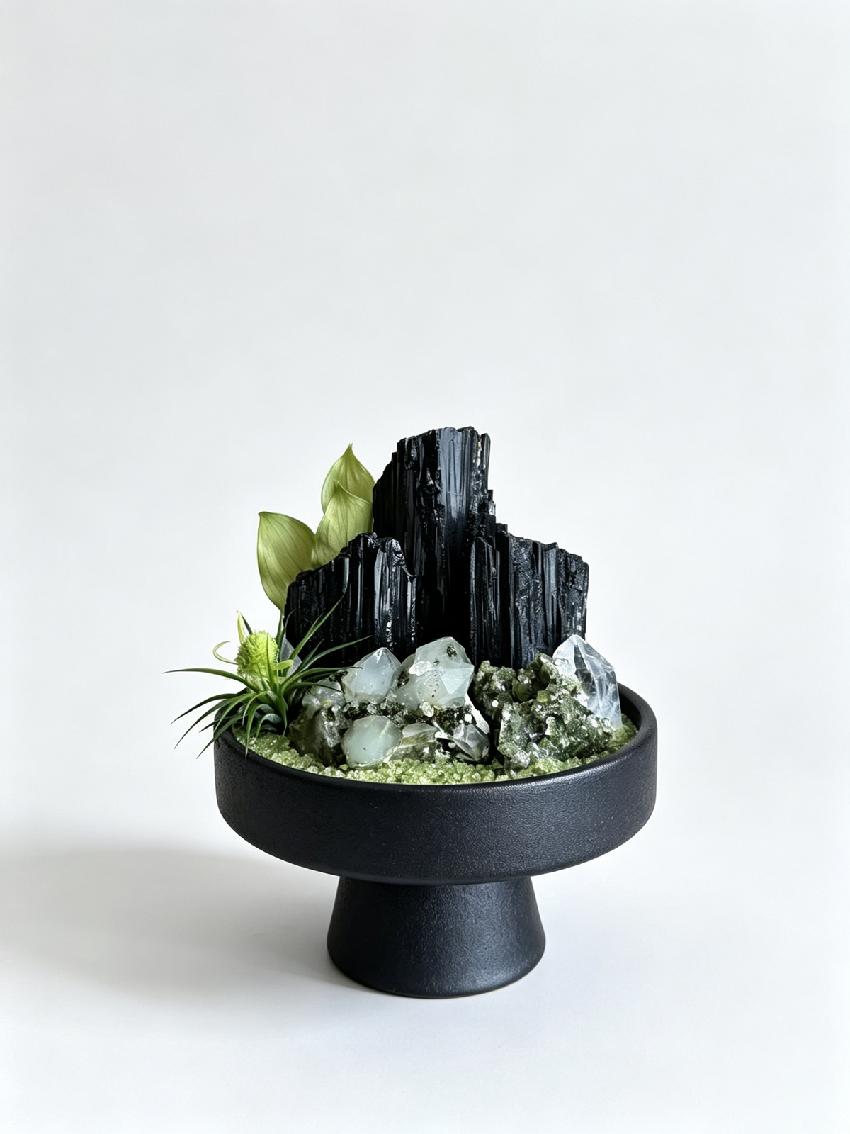 Soften stress & welcome organic growth. This 1-of-1 Wood element garden pairs raw green phantom quartz with tourmaline in black stoneware. Shop now.