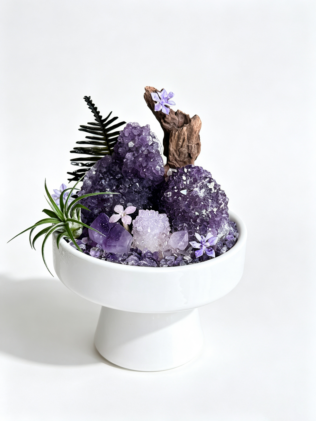 one-of-one crystal garden with twin amethyst clusters, pale amethyst, air plant; front view on pure white background.