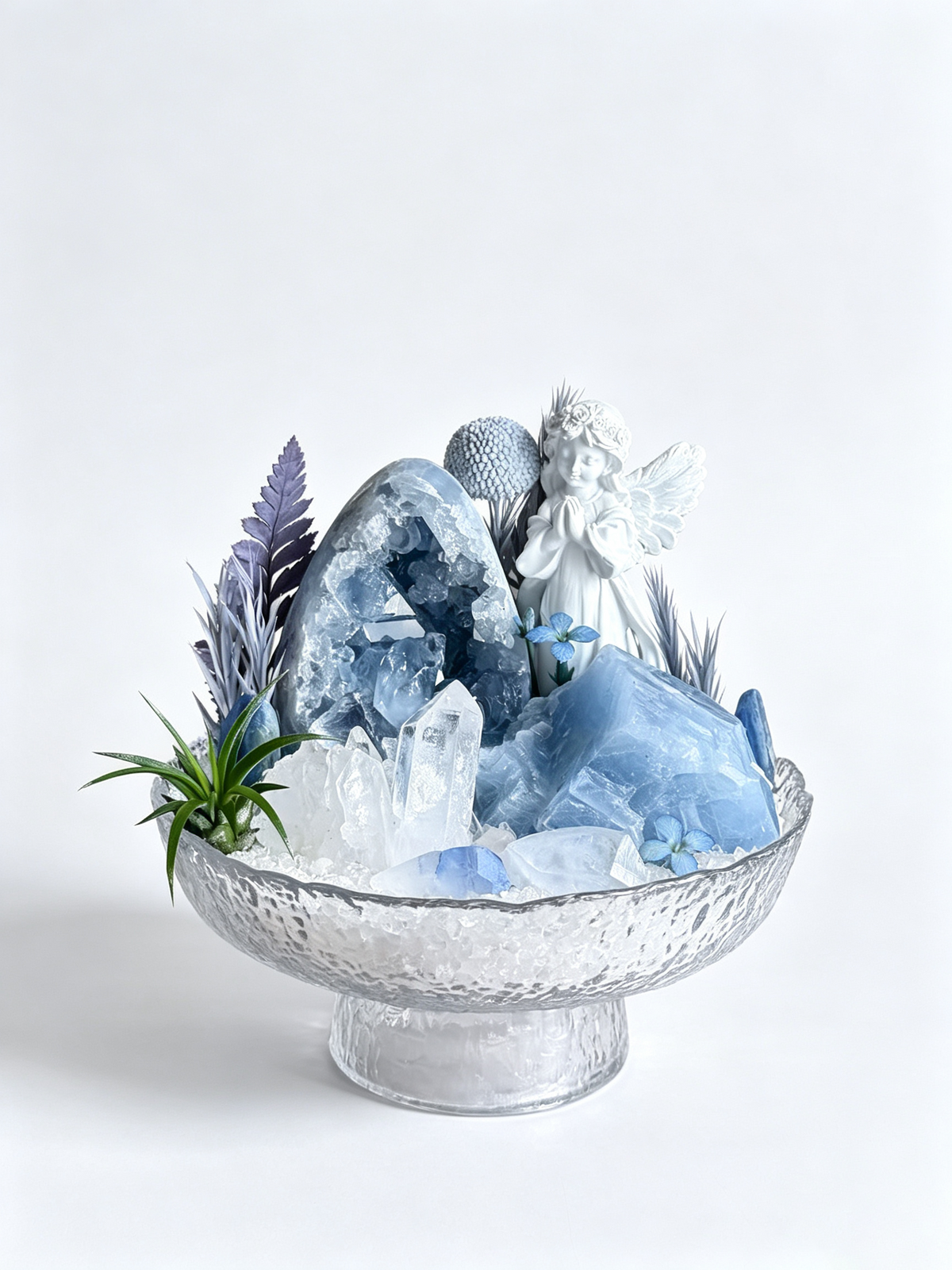 one-of-one crystal garden with porcelain angel, pink-white quartz pillars, golden citrine, amethyst, air plant; front view on pure white background.