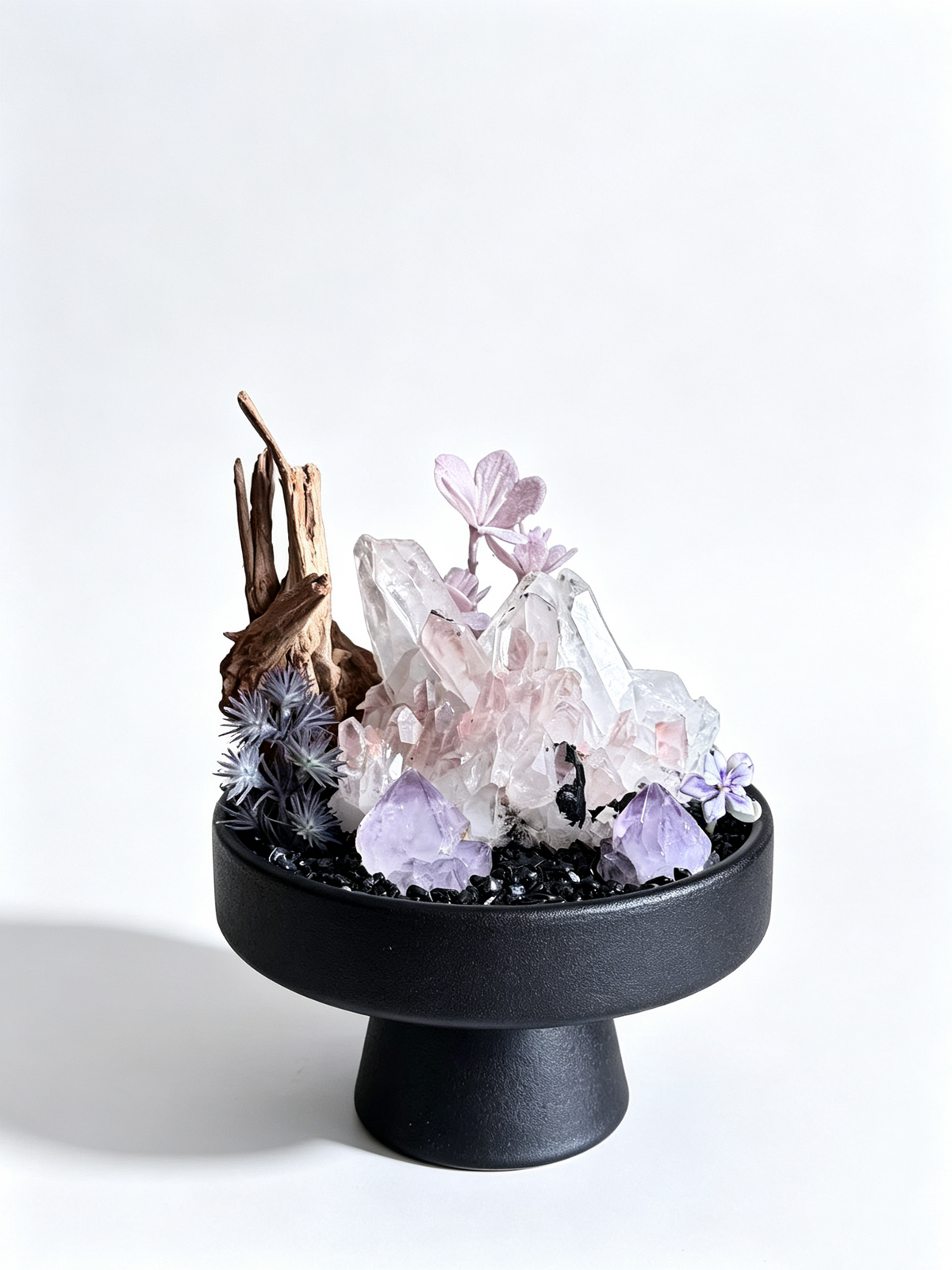 one-of-one crystal garden with smoky rose quartz, twin amethyst points, dried hydrangea, black tourmaline chips; front view on pure white background.