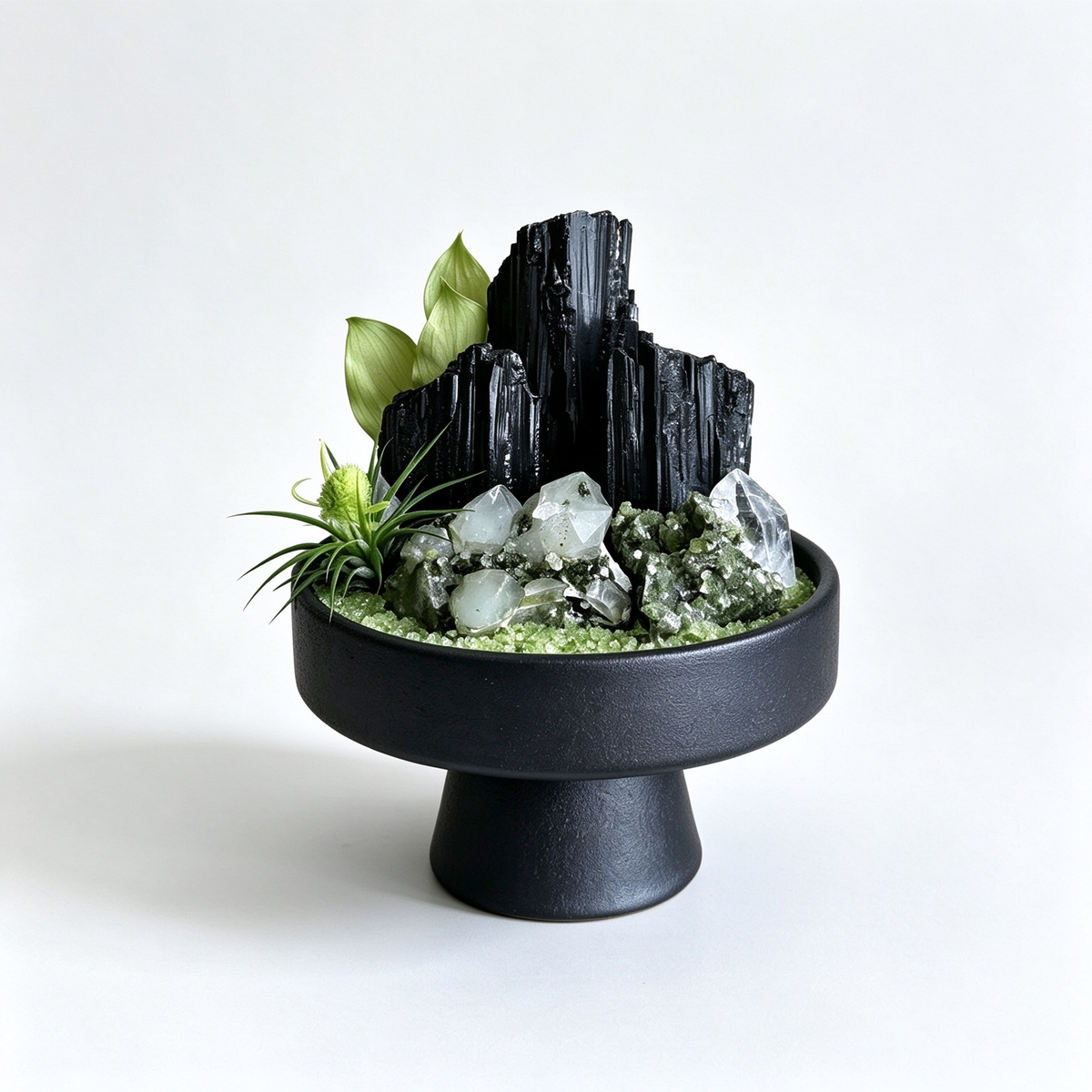 Soften stress & welcome organic growth. This 1-of-1 Wood element garden pairs raw green phantom quartz with tourmaline in black stoneware. Shop now.