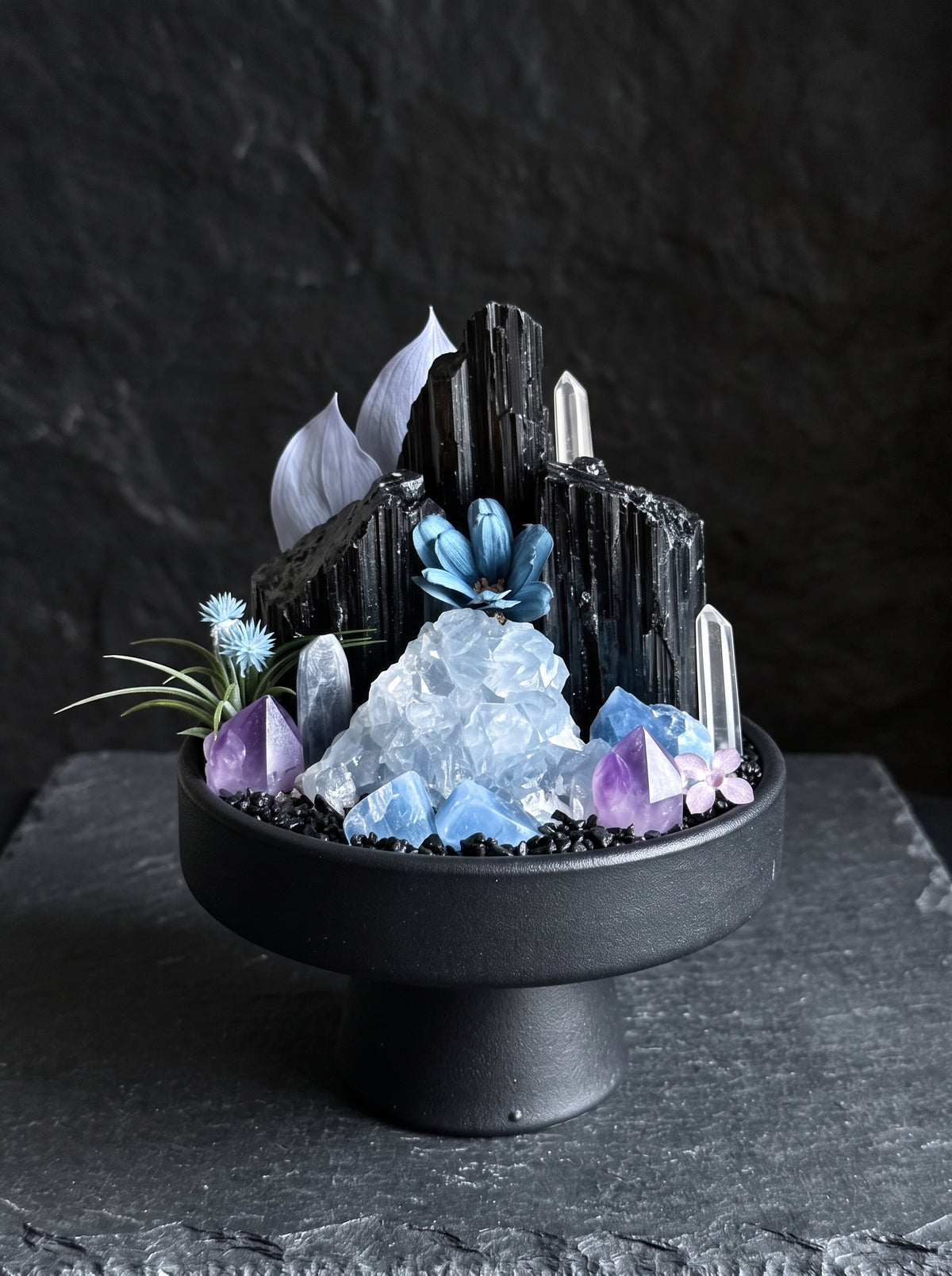 displayed on natural stone, styled setting.