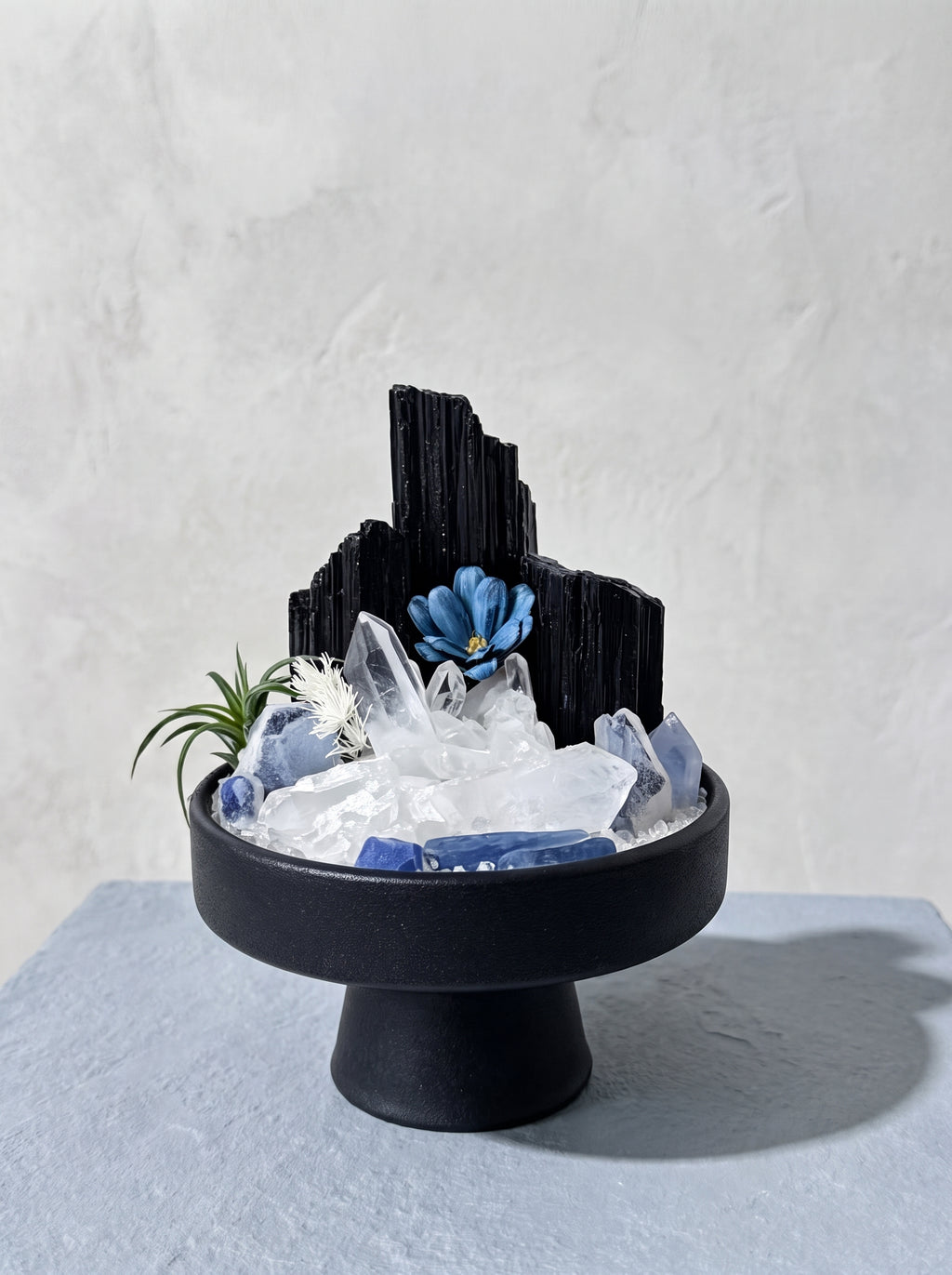displayed on natural stone, styled setting.